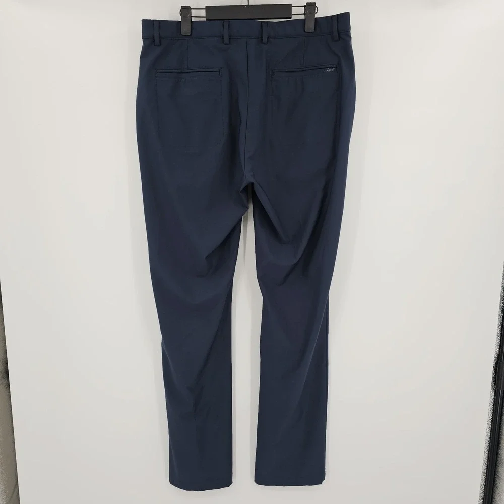 Greg Norman Men's Performance Pants Size 36x34 Navy Blue Golf Stretch Flat Front